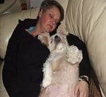 woman-dog-sleeping-on-couch